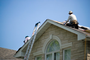 Workers Doing Roofing Repairs